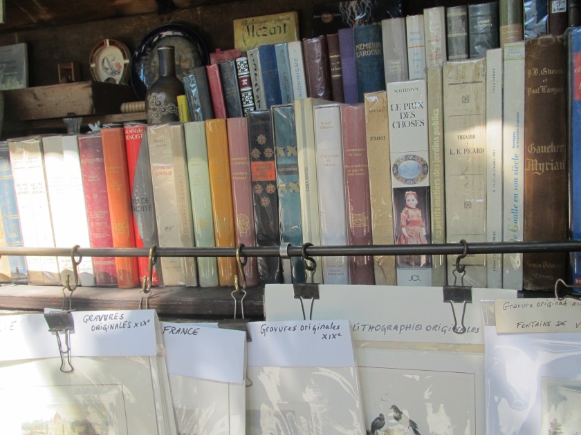 Antique books being sold by a vendor, somewhere in Paris